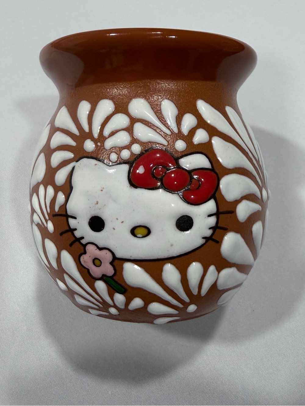 Hello Kitty Brown Ceramic Pot with Red Bow and White Floral Accents
